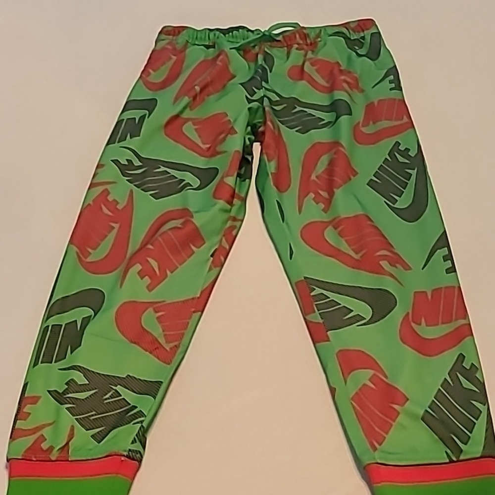 - Nike Swoosh 2017 pair of work out pants size Medium. measures W. 32"x L.…